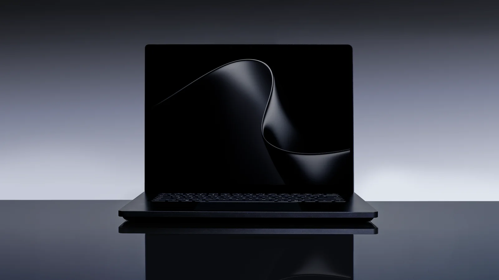 Official Microsoft publicity image of the Microsoft Surface Laptop Ultra open on a dark reflective surface.
